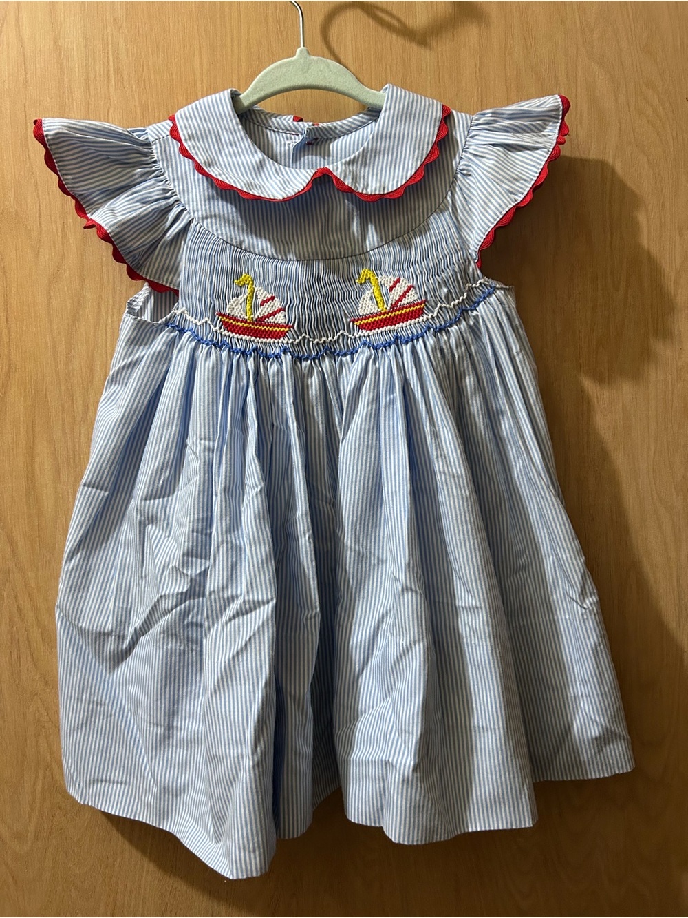 Blue Striped Smocked Kids Dress with Red Trim and Sailboat Embroidery